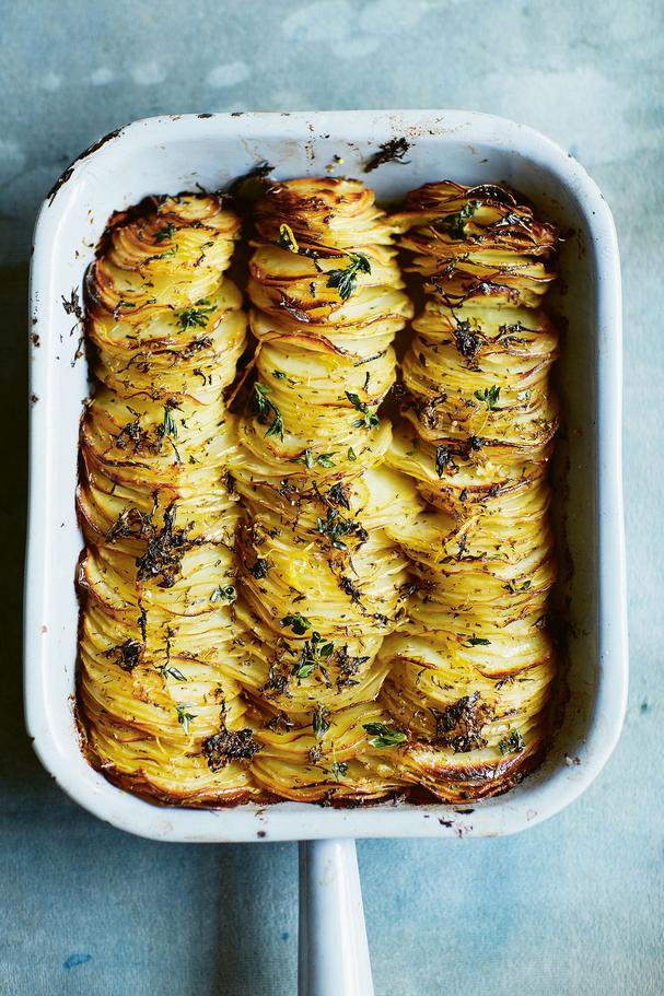 Crispy sliced and stacked lemon-roasted hasselback potatoes