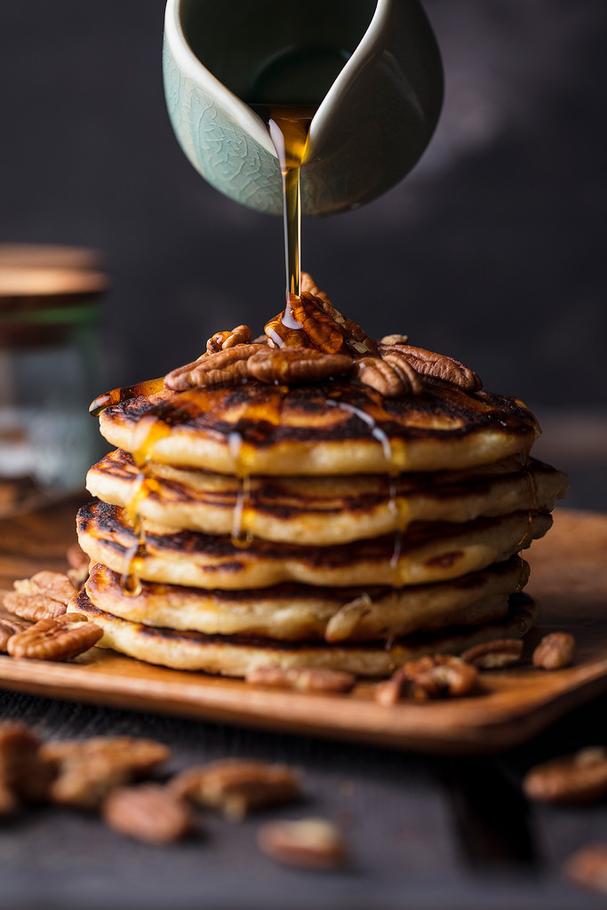 Pancakes with syrup drizzling 