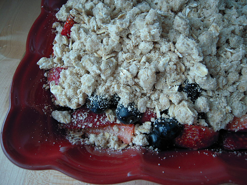 crumble oats over berries