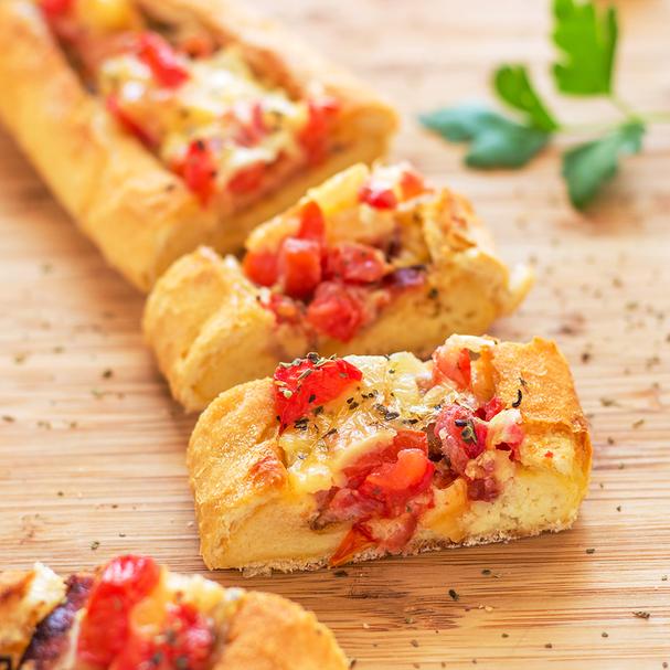 Breakfast Boat with tomatoes, bacon, and cheese